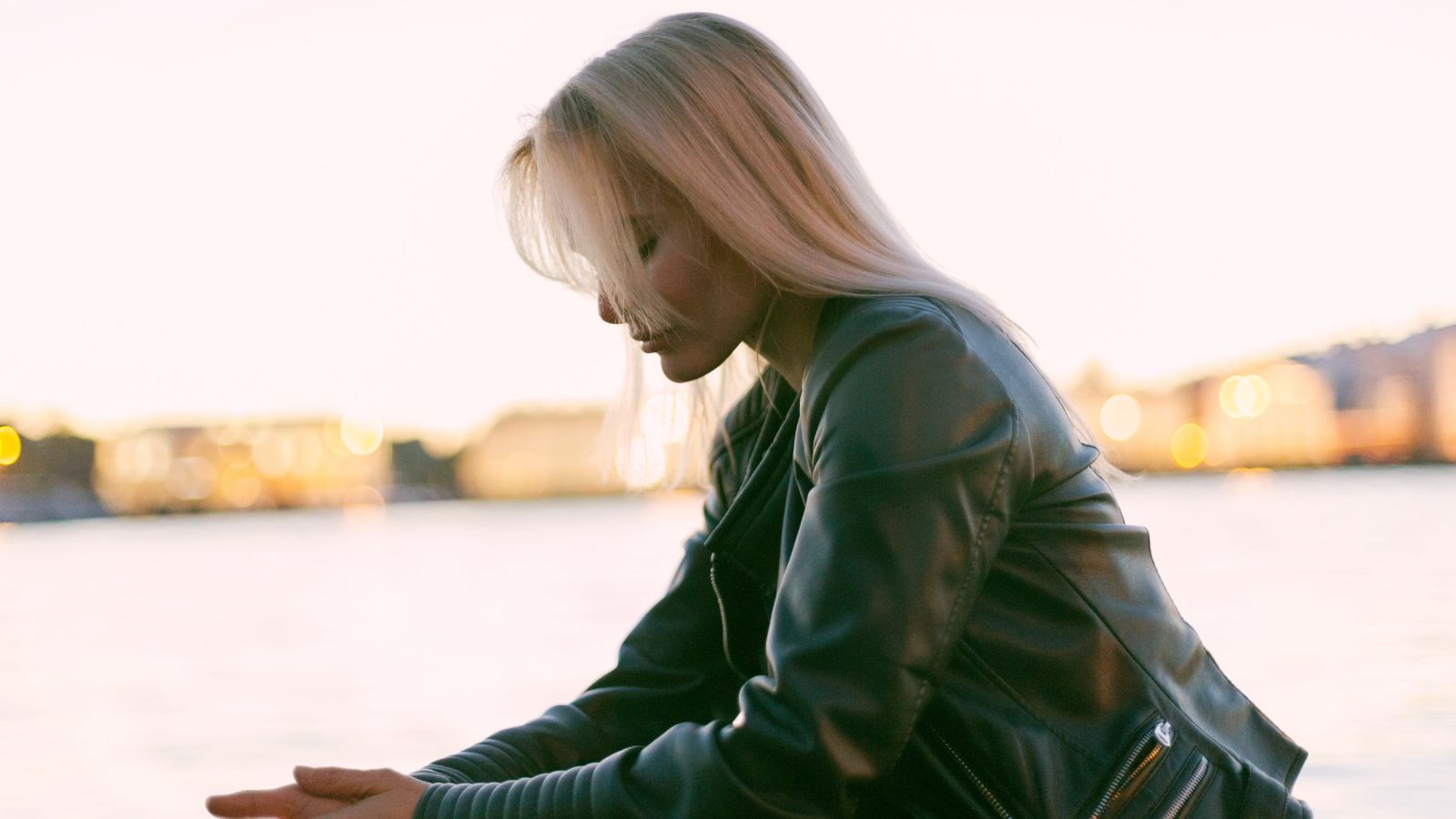 A woman in a leather jacket